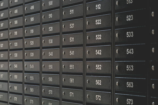 Mailboxes for letters and correspondence. Modern mailboxes with numbers in the lobby of a residential or office building close-up.