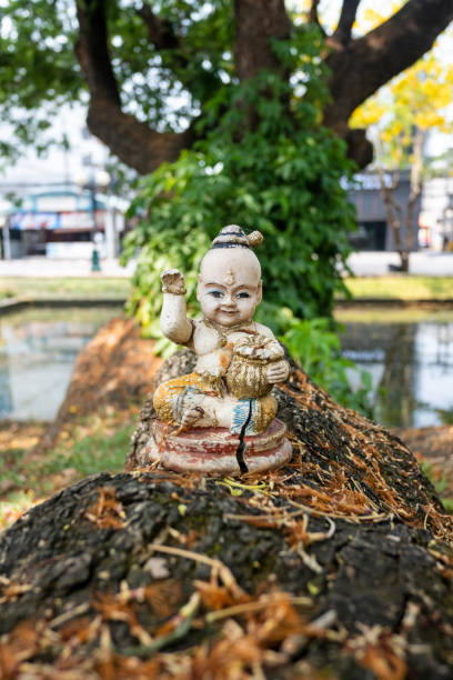 istock Thai religious figurine in the park 1465252291