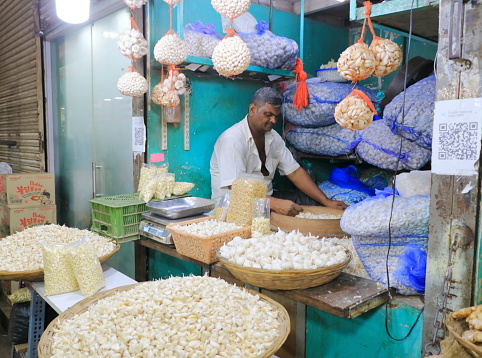 December 21 2022 - Mumbai, Maharashtra in India: traders offer their wares in the Crawford Market