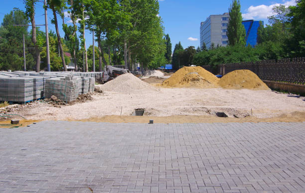 Road construction, paving slab laying.