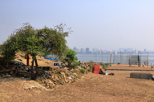 December 21 2022 - Mumbai, Maharashtra in India: fishing port in Mumbai near the Killeshwar Mahadev Temple and Madh Fort