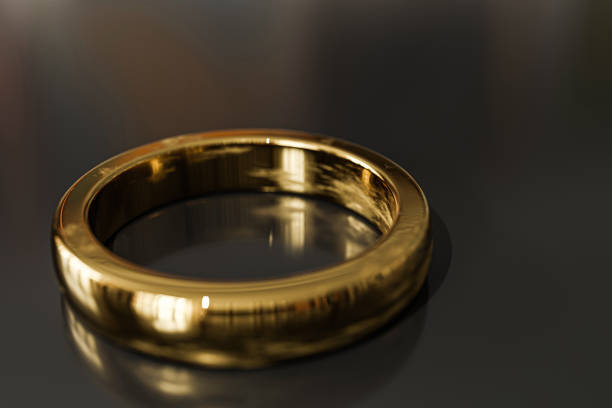 istock golden ring isolated on black background 1465254315