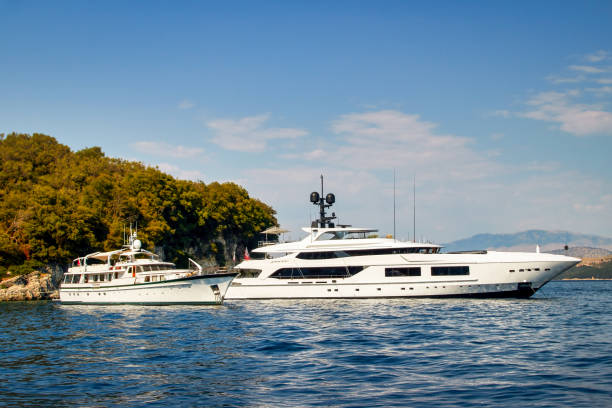 istock two yachts in a greek bay 1465260346