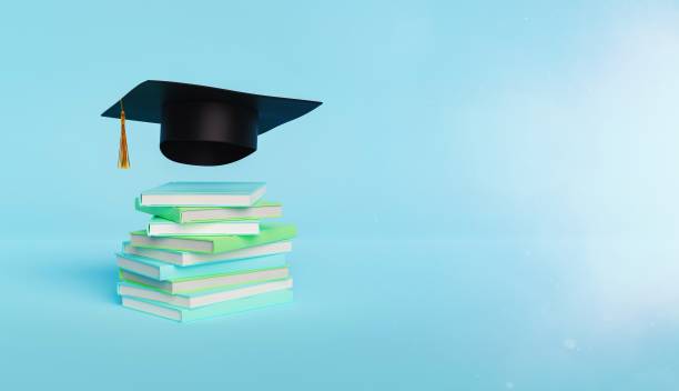 istock tack of Books with Graduation Cap 1465262883