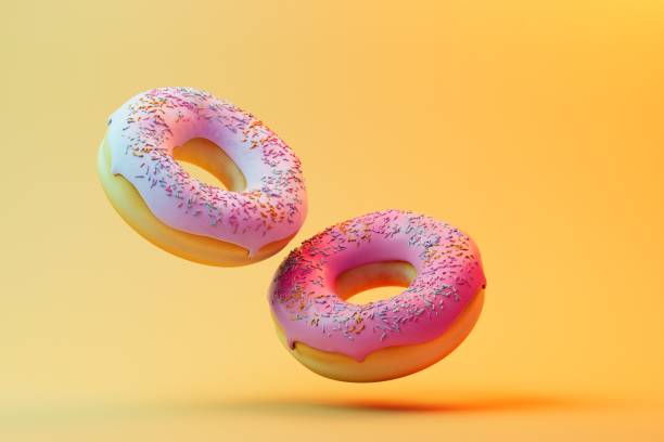 istock love of doughnuts. donuts with colored glaze flying across pastel backgrounds. 3D render 1465265366