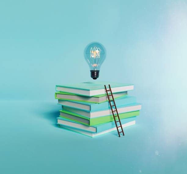 istock Stack of books with light bulb and ladder 1465265539