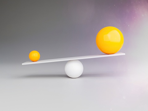 spheres in balance with different sizes and the small one with more weight than the big one. 3d render