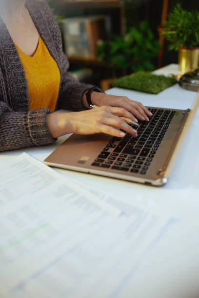 istock accountant woman with documents and laptop working 1465271582