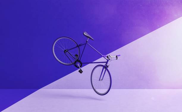 istock retro bike flying with wall divided into two colors 1465273829