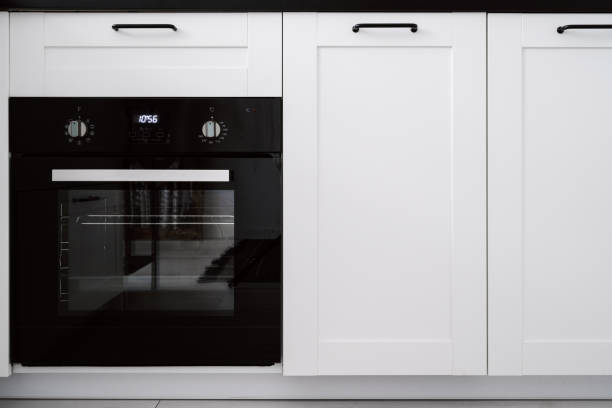 istock household appliance at modern kitchen, cooker with timer and knob button 1465275479