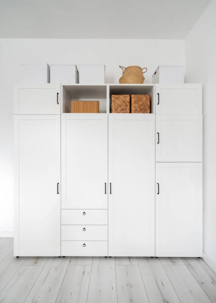 istock contemporary wooden closet with clothes and boxes 1465275539