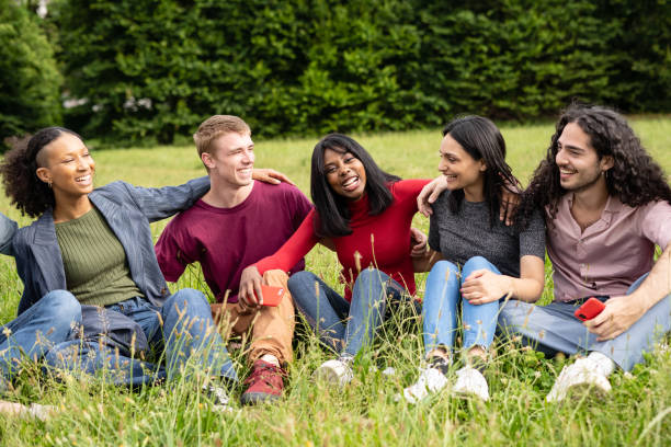istock Multicultural group of students studying together in harmony, sitting in the campus park. Their unity and focus representing the inclusive and empowering atmosphere of higher education 1465276222