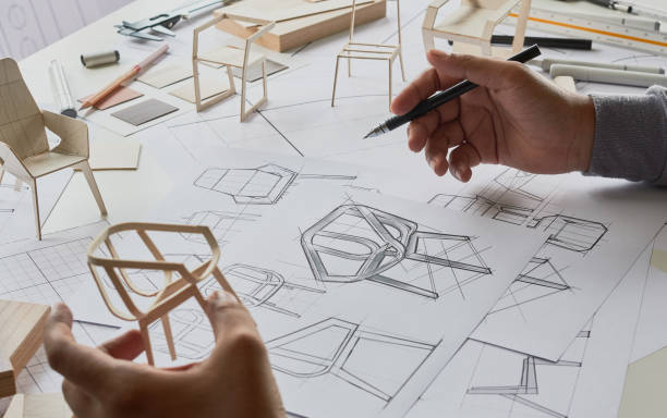 istock Designer sketching drawing design development product plan draft chair armchair Wingback Interior furniture prototype manufacturing production. designer studio concept . 1465276265
