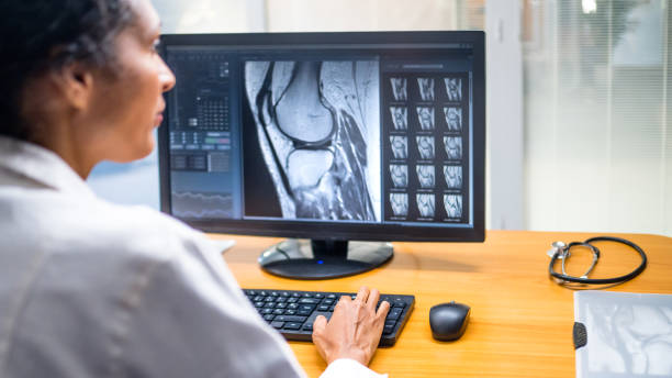 istock Radiologist analysing the images from the MRI scan 1465276381