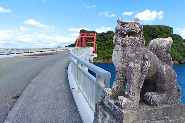 istock Okinawa Sea and Shisa blue sky Ikei Bridge 1465278381
