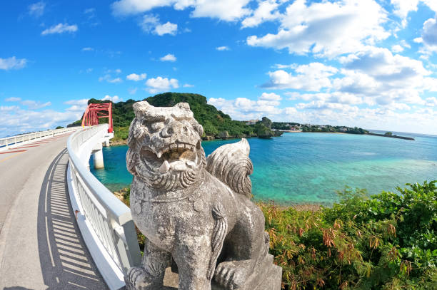 istock Okinawa Sea and Shisa blue sky Ikei Bridge 1465278383