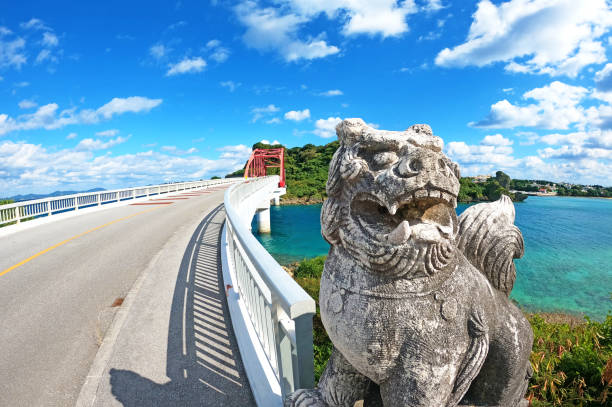 istock Okinawa Sea and Shisa blue sky Ikei Bridge 1465278414