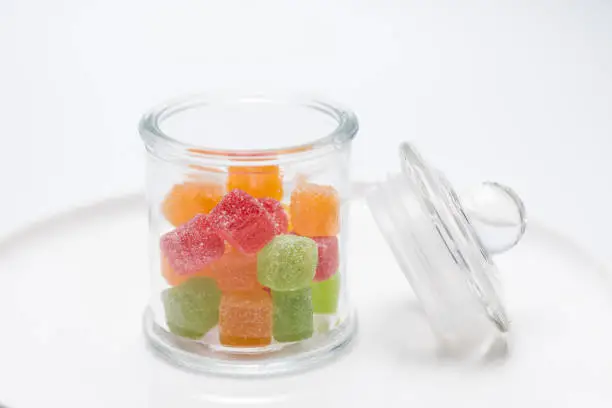 dice-shaped jellybean candies of various colors and flavors