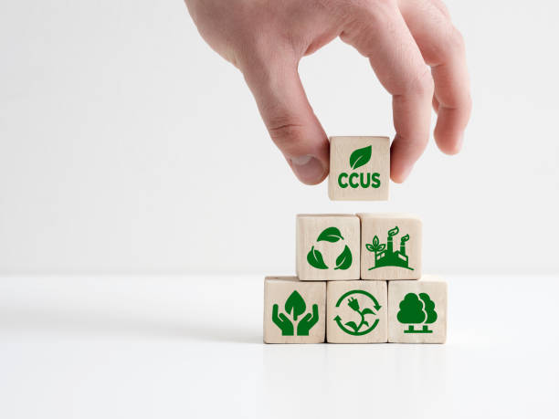 istock The acronym CCUS Carbon capture, utilization and storage on wooden cubes. CO2 capturing and storage technology. Net zero target to limit global warming. 1465285386