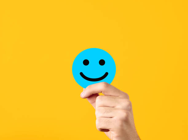istock Expression of positivity, customer satisfaction and positive feedback. Happiness and positive thinking. Male hand showing a blue circle with happy smiling face 1465286874