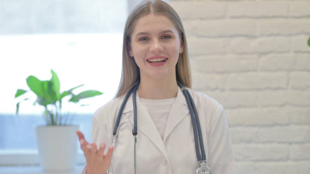 istock Female Doctor Talking on Online Video Call 1465289143