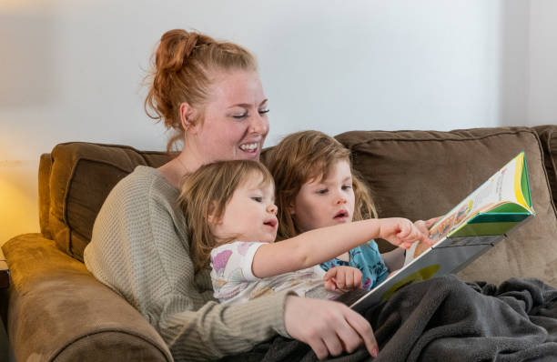 istock A mother reading to her children 1465293994