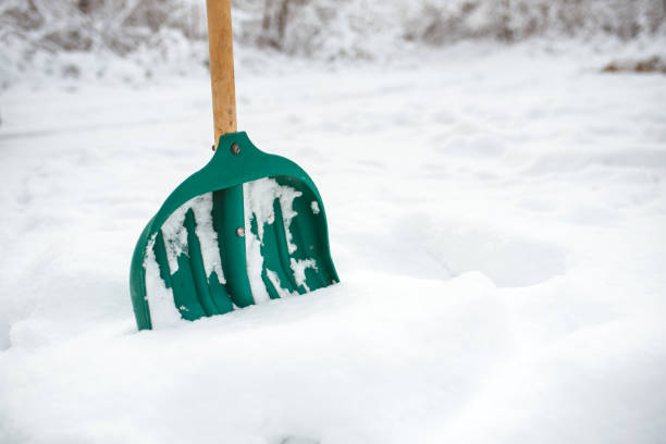 istock Snow shovel close up photo. 1465294272