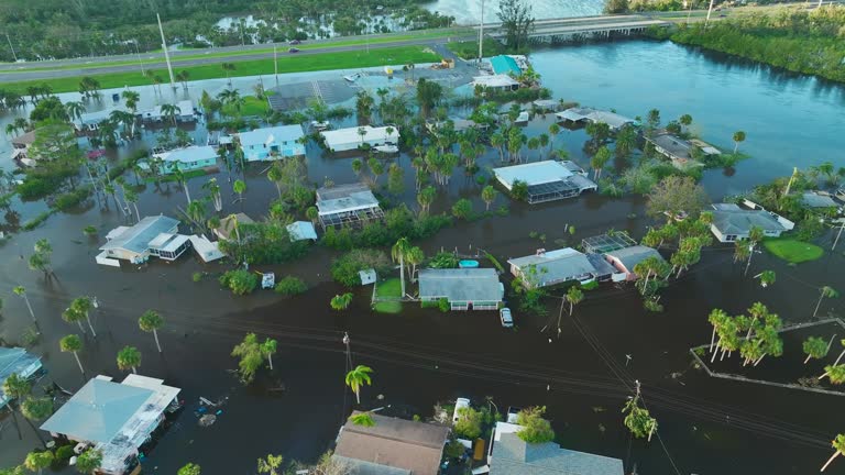 Flooded houses by hurricane Ian rainfall in Florida residential area. Consequences of natural disaster