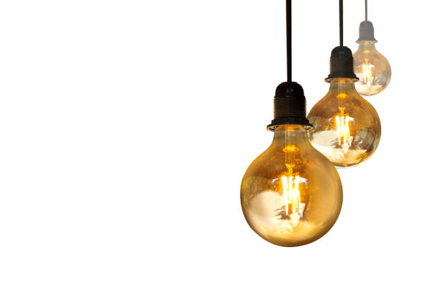 istock A row of three light bulbs hangs on a wire on a white background. 1465296800