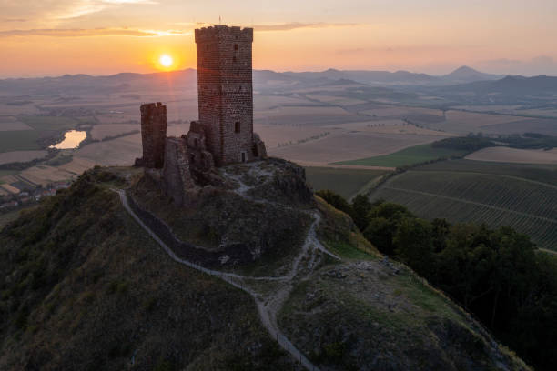 Castle on the hill landscape, mountains and peaks in background. Hazmburk ruines, Czech Castle on the hill landscape, mountains and peaks in background. Hazmburk ruines, Czech czech republic mountains stock pictures, royalty-free photos & images