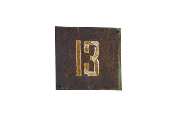 iron plate with number thirteen isolated on white background