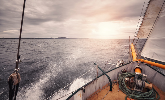 Compass on a yacht at sunset