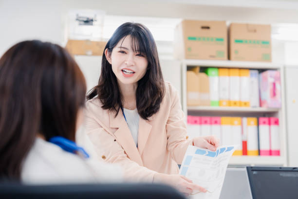 istock Two female office workers consulting in their office 1465304921