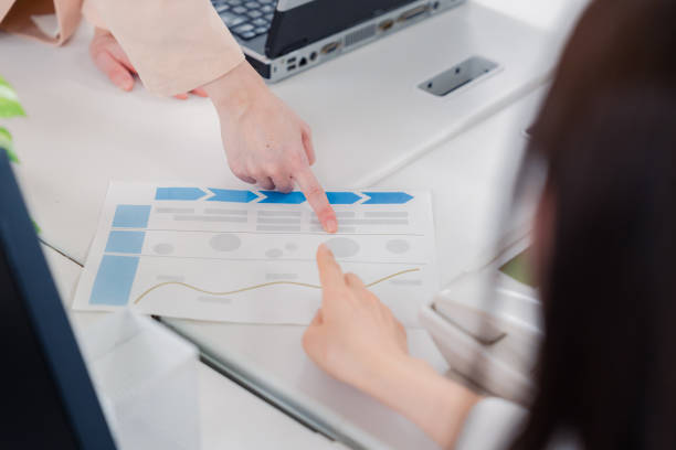 istock Two female office workers consulting in their office 1465304956