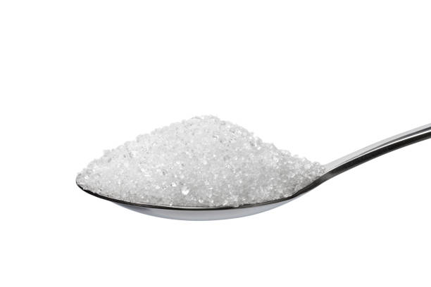 istock Spoon with white sweet crystal sugar on white background 1465305081