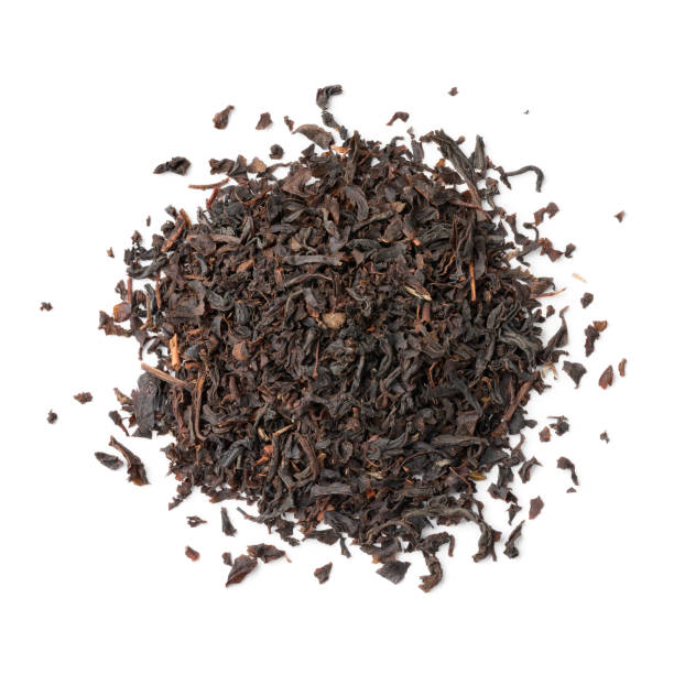 istock Heap of Indonesian Java Melange dried tea leaves close up on white background 1465305309