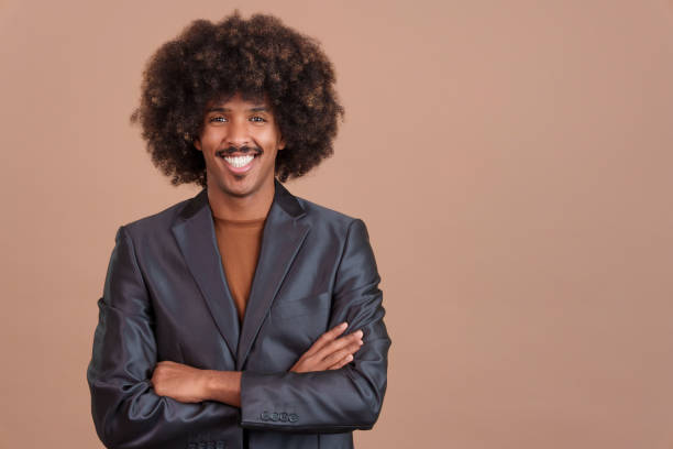 istock Smiley stylish african man with a jacket looking at camera 1465309472