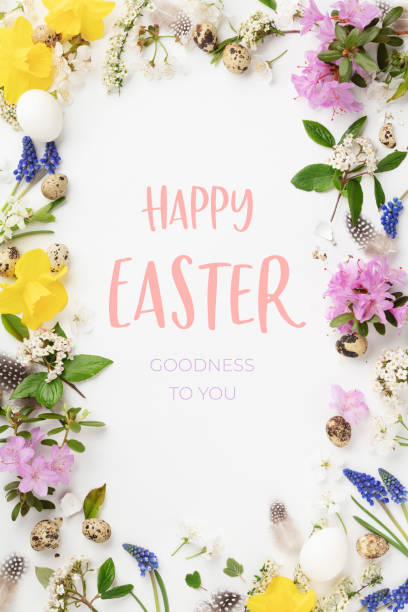 Happy Easter. Congratulatory easter background. Easter eggs and flowers. stock photo
