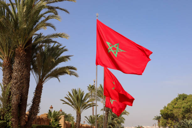 istock Waving Moroccan Flag with the Sky as the Background 1465314522