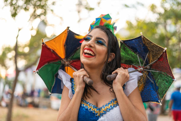 istock Woman holding frevo umbrellas 1465315183