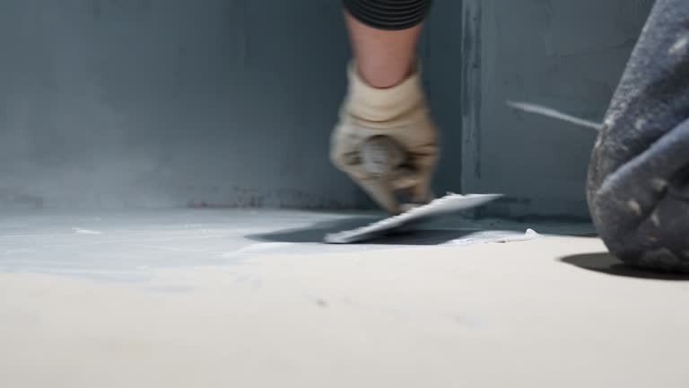 spread the insulation on the concrete floor using a trowel