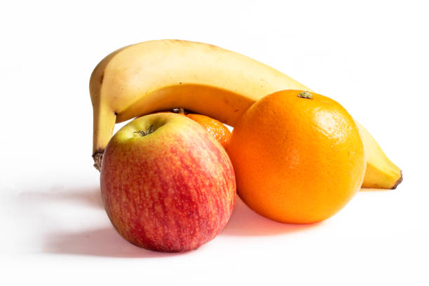 istock Apple, orange, mandarin, banana on white background 1465316428