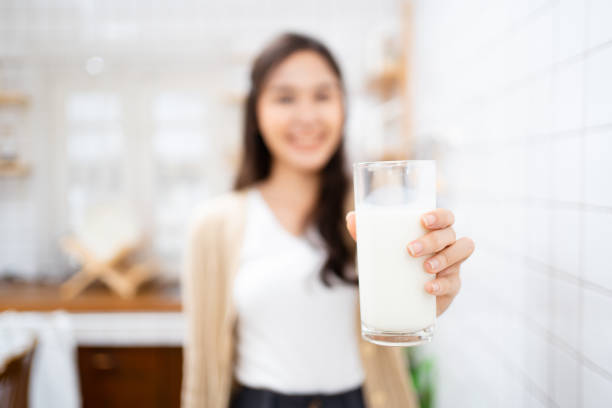 istock Woman drinking milk. 1465317477