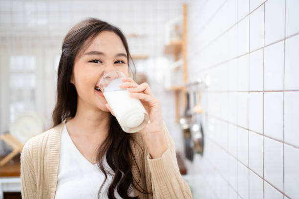 istock Woman drinking milk. 1465318214