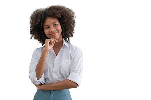 African American businesswoman smiling with crossed arms looking away on white background. with clipping path