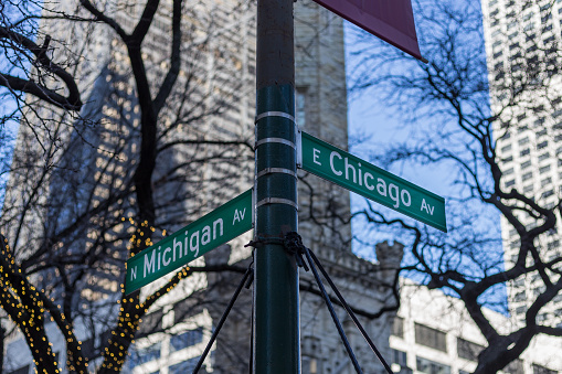 Corner of Michigan ave and Chicago Ave at the Magnificent Mile in uptown Chicago on clear day