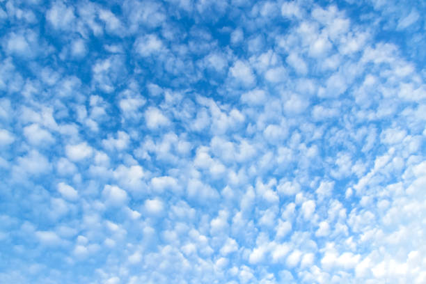 istock Cirrus clouds on a blue sky on a sunny day. Natural wallpaper. Background. mockup 1465320510