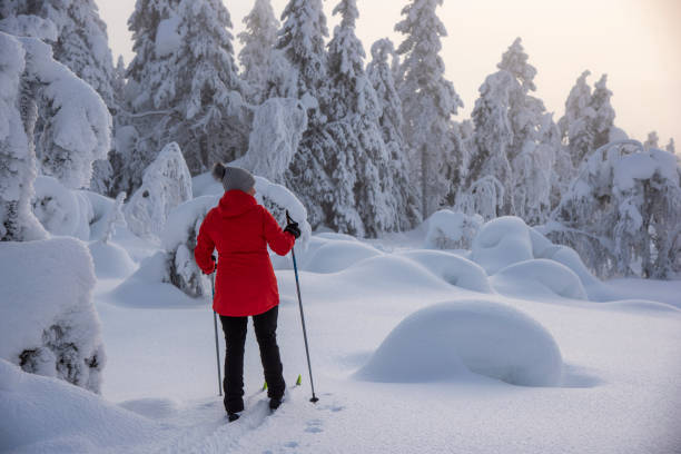 istock Woman cross country skiing 1465320562