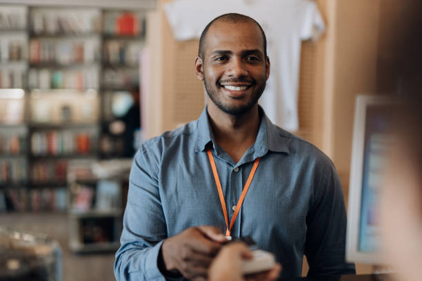 istock Customer at shop checkout counter 1465324365