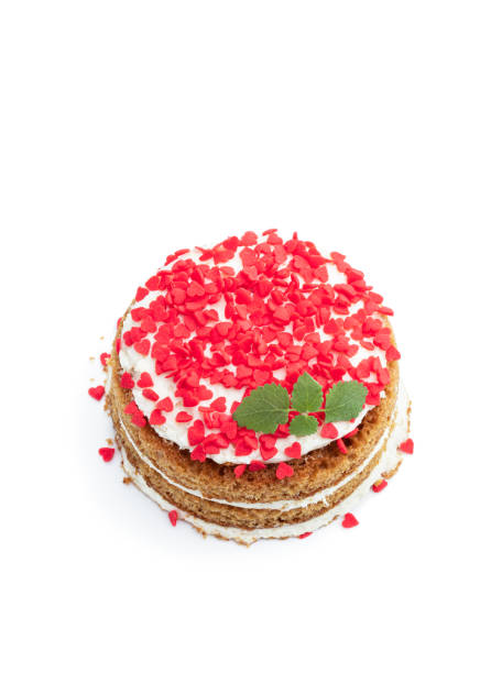 homemade layered dessert with whipped cream and heart shaped sprinkles isolated on white - raspberry heart shape gelatin dessert valentines day imagens e fotografias de stock